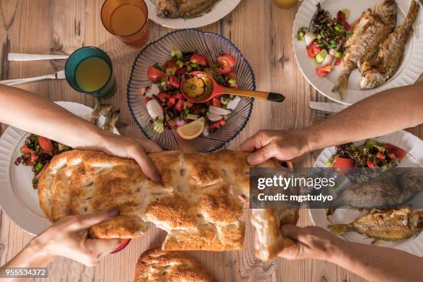 family ready for i̇ftar meal in ramadan - turkish bread stock pictures, royalty-free photos & images