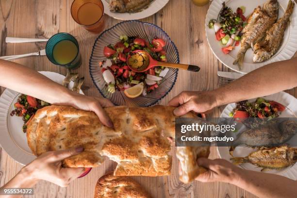 family ready for i̇ftar meal in ramadan - ramadan dinner stock pictures, royalty-free photos & images