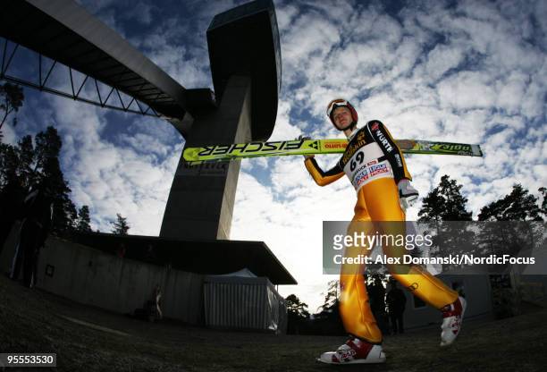 Pascal Bodmer of Germany walks up the jumping hill of the FIS Ski Jumping World Cup event of the 58th Four Hills ski jumping tournament on January 3,...