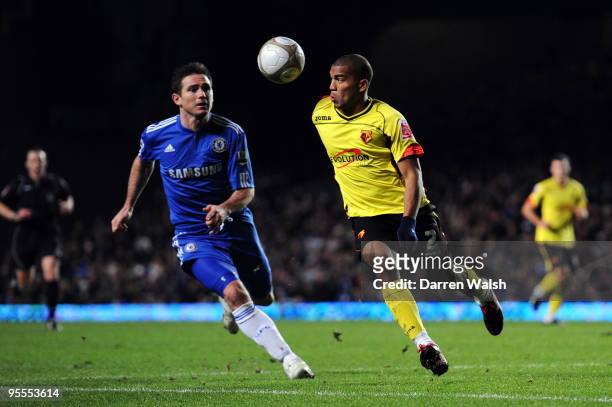 Frank Lampard of Chelsea and Adrian Mariappa of Watford battle for the ball during the FA Cup sponsored by E.ON Final 3rd round match between Chelsea...