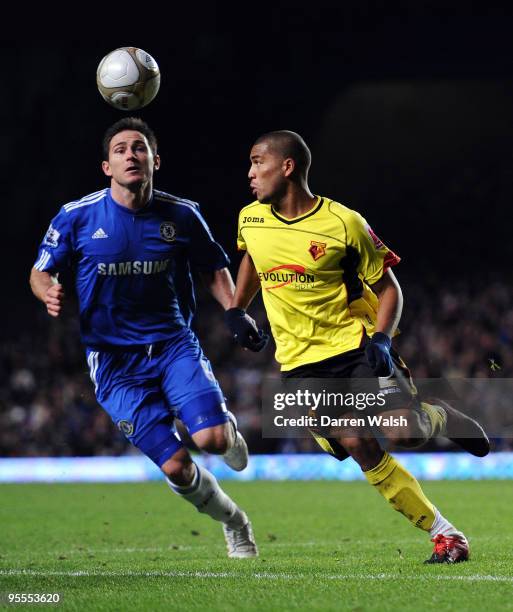 Frank Lampard of Chelsea and Adrian Mariappa of Watford battle for the ball during the FA Cup sponsored by E.ON Final 3rd round match between Chelsea...