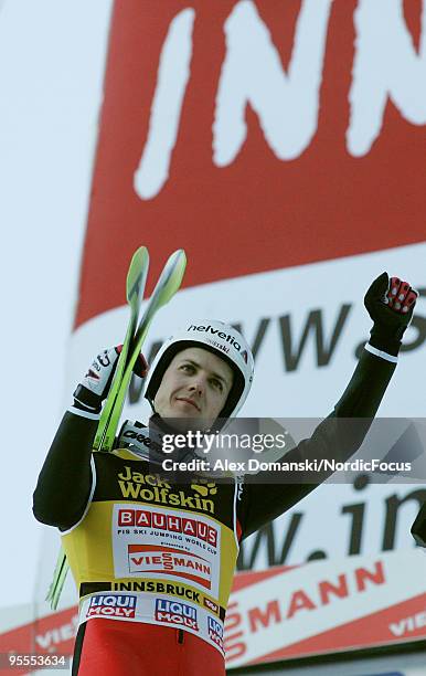 Simon Ammann of Switzerland celebrates after taking second place in the FIS Ski Jumping World Cup event of the 58th Four Hills ski jumping tournament...
