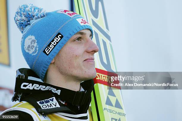 The winner Gregor Schlierenzauer of Austria is seen on the podium during the FIS Ski Jumping World Cup event of the 58th Four Hills ski jumping...