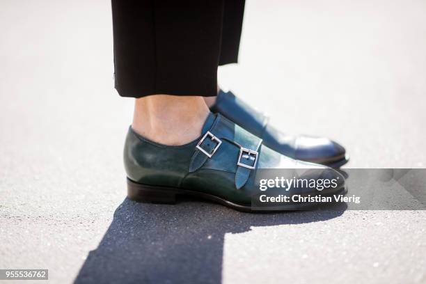 Alexandra Lapp wearing high waist black ankle cropped trousers by Zara, a blue Steffen Schraut denim shirt, a black vintage logo belt by Hermes, the...