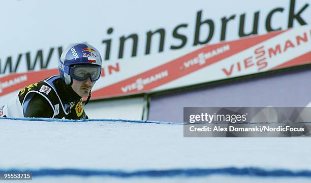 Adam Malysz reacts after the final jump during the FIS Ski Jumping World Cup event of the 58th Four Hills ski jumping tournament on January 3, 2010...