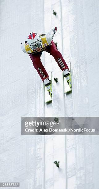 Simon Ammann of Switzerland competes during the FIS Ski Jumping World Cup event of the 58th Four Hills ski jumping tournament on January 3, 2010 in...