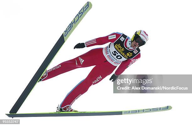 Andreas Kuettel of Switzerland competes during the FIS Ski Jumping World Cup event of the 58th Four Hills ski jumping tournament on January 3, 2010...