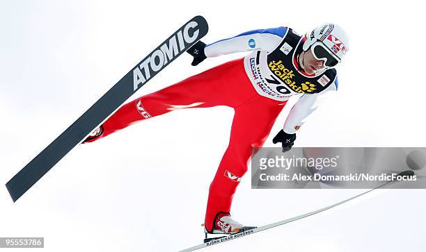 Bjoern Einar Romoeren of Norway competes during the FIS Ski Jumping World Cup event of the 58th Four Hills ski jumping tournament on January 3, 2010...