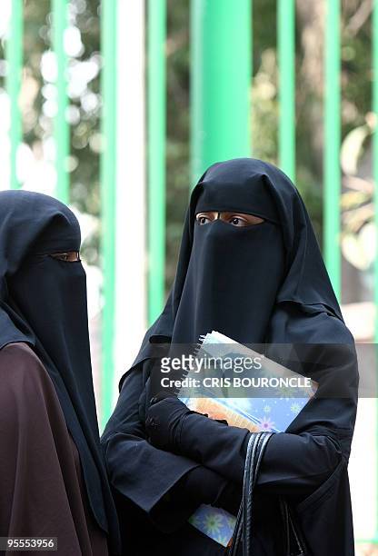 -- File picture dated October 7, 2009 shows conservative Cairo University students wearing the niqab, a black veil which covers the face except for...