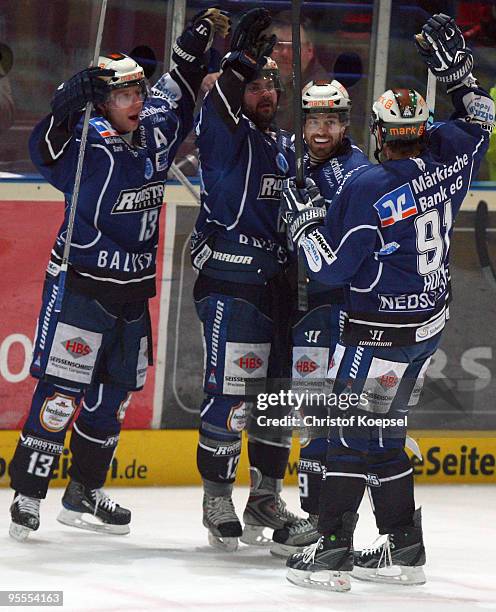 Mark Ardelan of Iserlohn Roosters celebrates the fourth goal with Michael Wolf , Daniel Sparre and Robert Hock during the DEL match between Iserlohn...