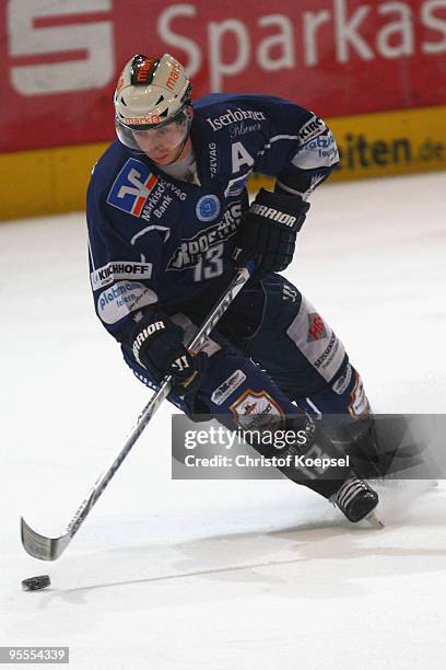 Michael Wolf of Iserlohn Roosters leads the puck during the DEL match between Iserlohn Roosters and Adler Mannheim at the Ice Sports Hall Iserlohn on...