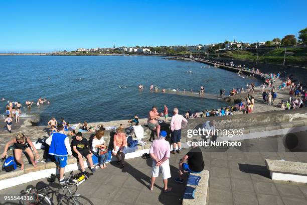 View of crowded costline near Seapoint Martello tower as temperatures remain over 20C during May Bank Holiday weekend. On Sunday, May 6 in Dublin,...