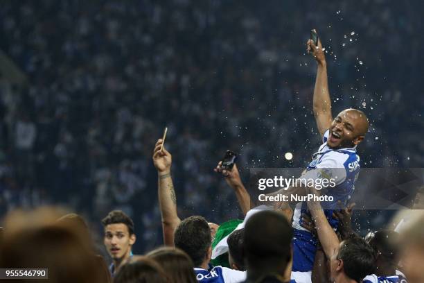 Porto's Algerian forward Yacine Brahimi celebrates the title of national champion during the Premier League 2017/18 match between FC Porto and CD...