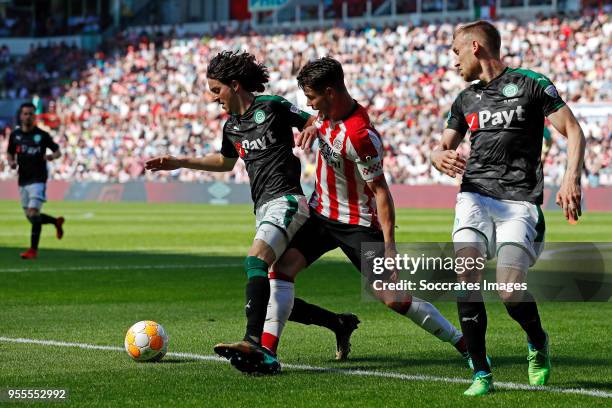 Amir Absalem of FC Groningen, Marco van Ginkel of PSV, Mike te Wierik of FC Groningen during the Dutch Eredivisie match between PSV v FC Groningen at...