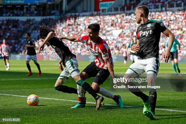 Amir Absalem of FC Groningen, Marco van Ginkel of PSV, Mike te Wierik of FC Groningen during the Dutch Eredivisie match between PSV v FC Groningen at...