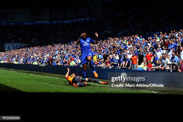 Kenneth Zohore of Cardiff City in action with Tiago Ilori of Reading during the Sky Bet Championship match between Cardiff City and Reading at...