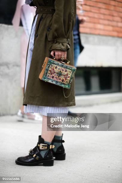 Bag and Balenciaga shoe details at Mercedes-Benz Fashion Week Tbilisi FW18 on May 4, 2018 in Tbilisi, Georgia.