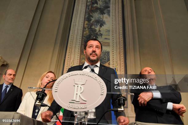 Matteo Salvini , leader of the far-right party "Lega" speaks to the press flanked by Silvio Berlusconi , leader of the right-wing party "Forza...