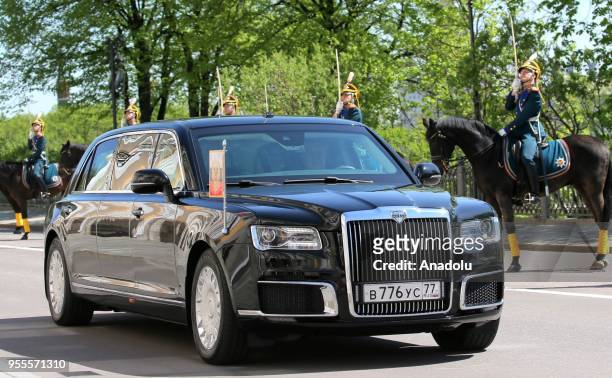 President-elect Vladimir Putin arrives for his inauguration ceremony as President of Russia in an Aurus car of the presidential motorcade, at the...