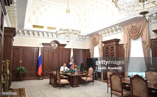 President-elect Vladimir Putin is seen in his office prior to his inauguration ceremony as President of Russia at the Kremlin Palace in Moscow,...