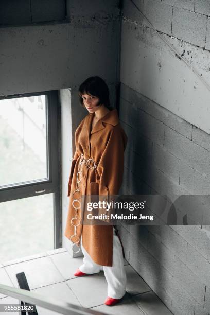 Model Mary Bitchashvili backstage at Materiel by Materiel by Lado Bokuchava FW18 on May 6, 2018 in Tbilisi, Georgia.