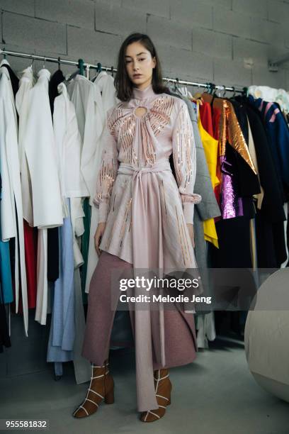 Model Irina Jijikhia backstage at Materiel by Materiel by Lado Bokuchava FW18 on May 6, 2018 in Tbilisi, Georgia.