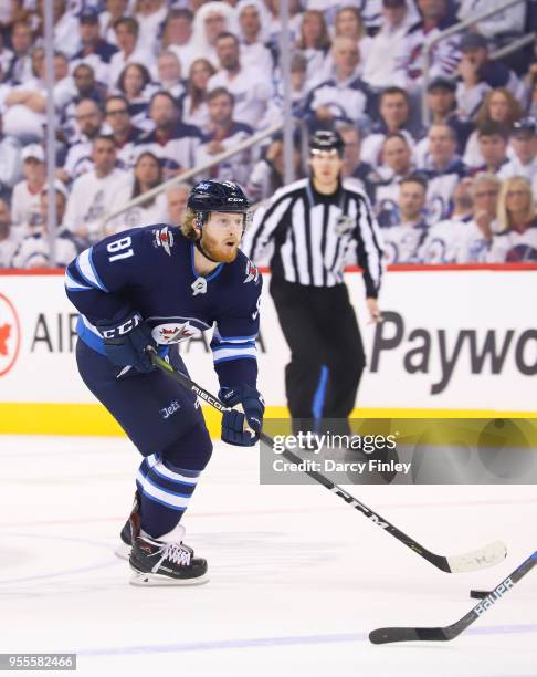 Kyle Connor of the Winnipeg Jets plays the puck down the ice during first period action against the Nashville Predators in Game Four of the Western...