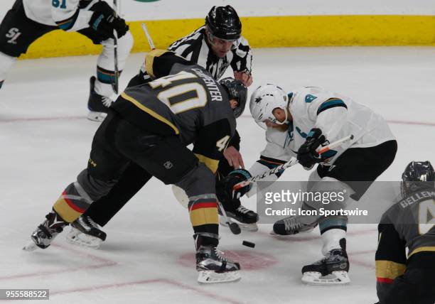 Vegas Golden Knights left wing Pierre-Edouard Bellemare and San Jose Sharks center Joe Pavelski face-off during Game 5 of the Western Conference...