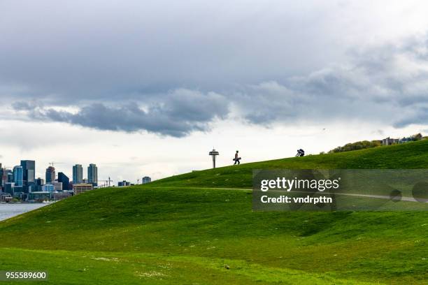 gasworks park skateboarders - gasworks stock pictures, royalty-free photos & images