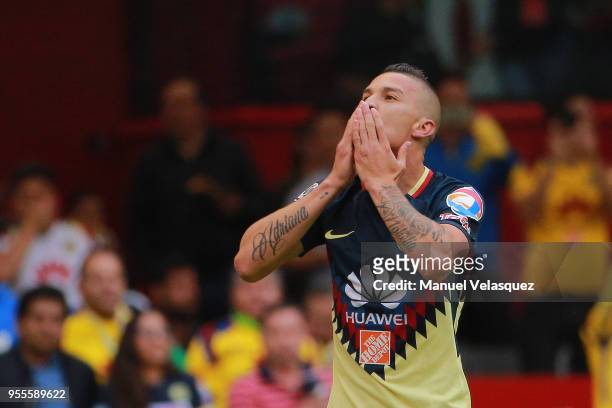 Andres Uribe of America celebrates after scoring the first goal of his team during the quarter finals second leg match between America and Pumas UNAM...