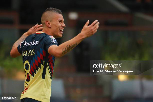 Andres Uribe of America celebrates after scoring the first goal of his team during the quarter finals second leg match between America and Pumas UNAM...