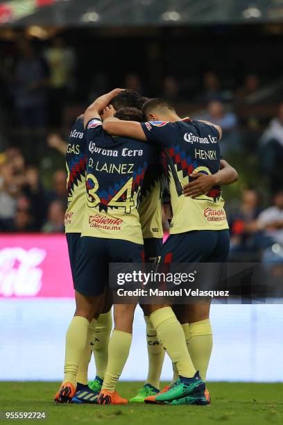 Jorge Ibarguen of America celebrates with teammates after scoring the second goal of his team during the quarter finals second leg match between...