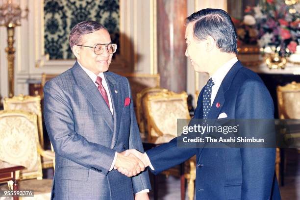 Maldives President Maumoon Abdul Gayoom and Japanese Prime Minister Toshiki Kaifu shake hands prior to their meeting at the Akasaka State Guest House...