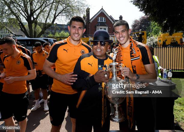 Danny Batth and Conor Coady of Wolverhampton Wanderers enjoy the Wolverhampton Wanderers Promotion celebration with Tito Jackson during their...