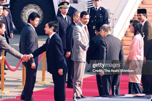 Crown Prince Naruhito sees off Sultan Hassanal Bolkiah of Brunei Darussalam after Emperor Akihito's Enthronement Ceremony at Haneda Airport on...