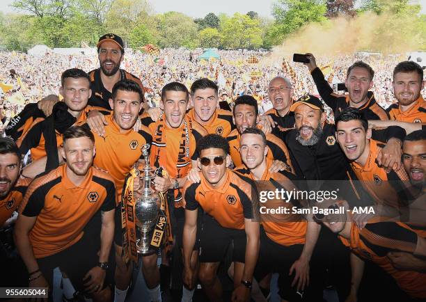 Players of Wolverhampton Wanderers during their celebrations of winning the Sky Bet Championship on a winners parade around the city of Wolverhampton...