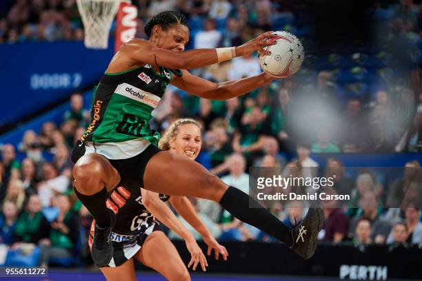 Stacey Francis of the Fever makes an interception during the round two Super Netball match between the Fever and the Magpies at Perth Arena on May 5,...