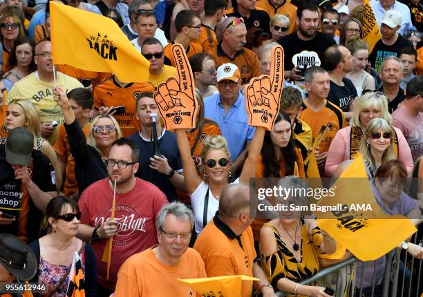 Fans of Wolverhampton Wanderers during their celebrations of winning the Sky Bet Championship on a winners parade around the city of Wolverhampton on...