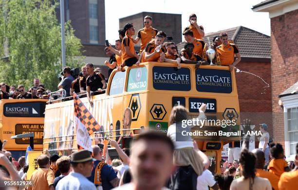 Wolverhampton Wanderers on an open topped bus during their celebrations of winning the Sky Bet Championship on a winners parade around the city of...