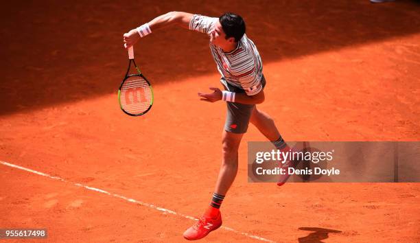 Milos Raonic of Canada returns a shot to Nicolas Kicker of Argentina 1st Round of day three of the Mutua Madrid Open tennis tournament at the Caja...