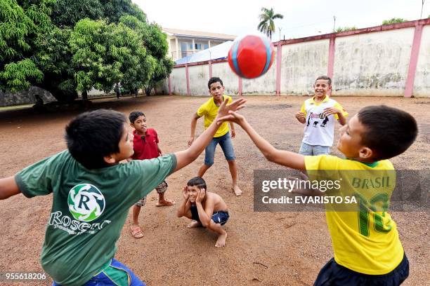 Venezuelan refugee children play at the UNHCR's Jardim Floresta Camp in Boa Vista, Roraima state, north of Brazil on May 3, 2018. - The Brazilian...