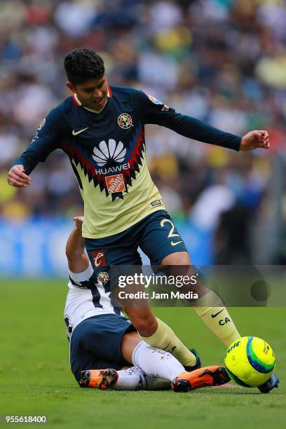 Pablo Barrera of Pumas fights for the ball with Carlos Vargas of America during the quarter finals second leg match between America and Pumas UNAM as...