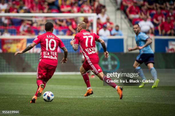 Alejandro Romero Gamarra "Kaku" #10 of the New York Red Bulls and Daniel Royer of New York Red Bulls look for the opening during the New York Derby...