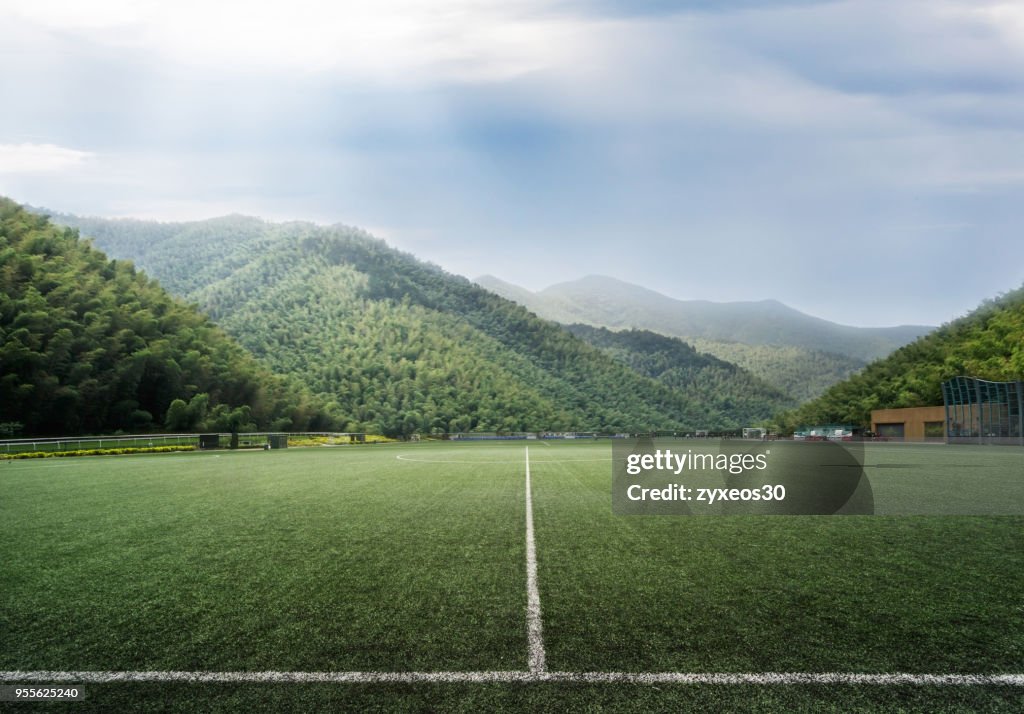 Soccer stadium in the natural environment.China - East Asia,