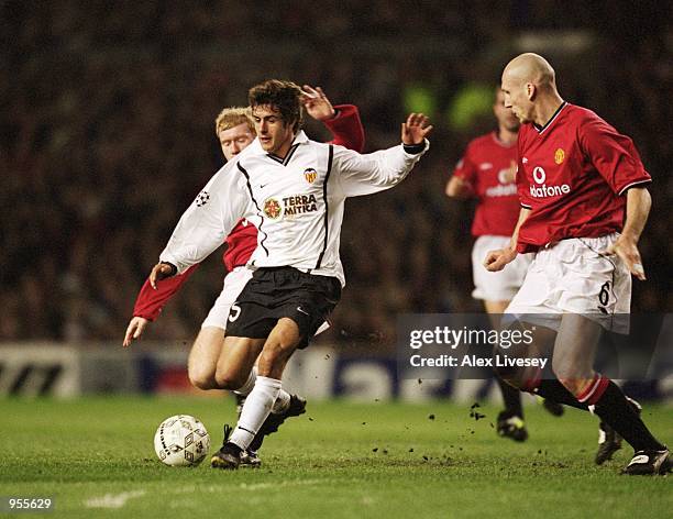 Pablo Cesar Aimar of Valencia shows his talent and skill to leave the defence standing still during the UEFA Champions League Group A match against...