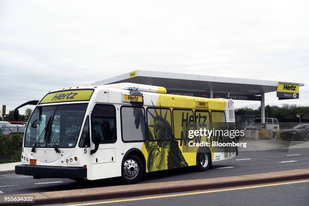Hertz Global Holdings Inc. Shuttle bus exits the company's rental location at LaGuardia Airport in the Queens borough of New York, U.S., on Sunday,...