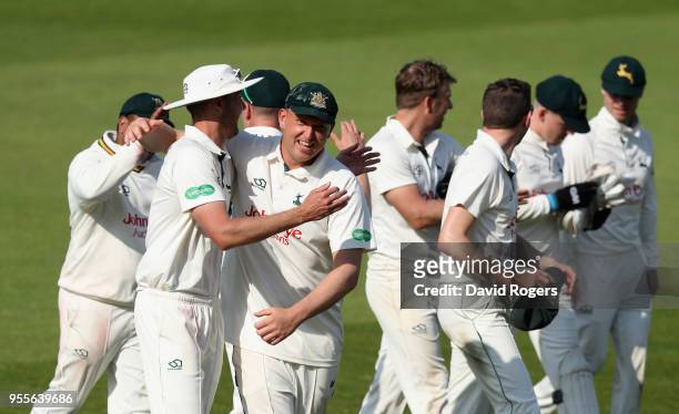 Nottinghamshire players celebrate their victory during day four of the Specsavers County Championship Division One match between Nottinghamshire and...