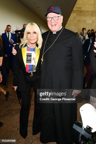 Donatella Versace and Cardinal Timothy Dolan attend the Heavenly Bodies: Fashion & The Catholic Imagination Costume Institute Gala Press Preview at...