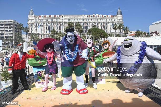 Monster characters pose for a colourful photocall to launch sneak peek of 'Hotel Transylvania 3' on May 7, 2018 in Cannes, France.