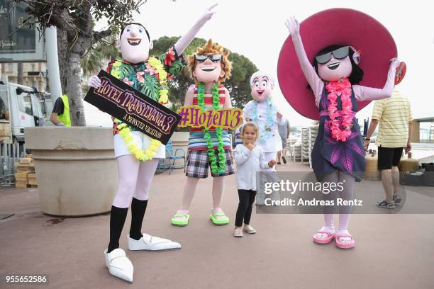 Monster characters pose for a colourful photocall to launch sneak peek of 'Hotel Transylvania 3' on May 7, 2018 in Cannes, France.